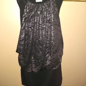 Black tank top blouse with beaded straps.
